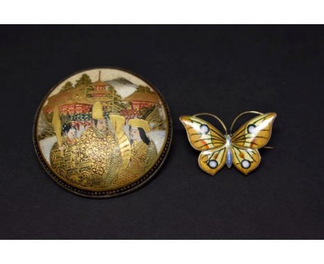 A .830 silver gilt and coloured enamel butterfly brooch, 33mm; together with a Japanese Satsuma circular convex brooch decora