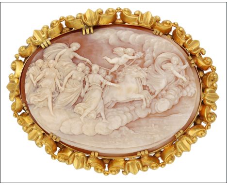 A shell cameo brooch, second half of 19th century, carved to depict Aurora (Dawn) in billowing dress, carrying garlands of fl