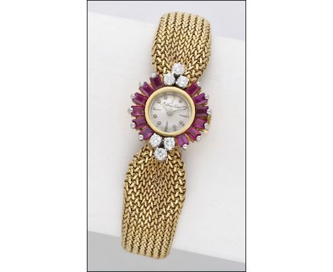 Mathey-Tissot. A lady’s gold, ruby and diamond-set bracelet watch, circa 1960 Movement: manual winding Dial: silvered, applie