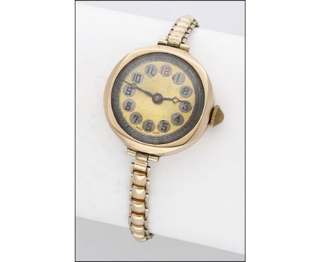 Swiss. A lady’s gold wristwatch, circa 1926 Movement: manual winding, cylinder escapement, 8 jewels Dial: gilt, engine-turned