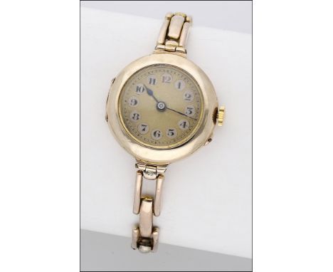 Swiss. An early lady’s gold wristwatch with sprung bracelet, circa 1912 Movement: manual winding Dial: gilt, engine-turned, A