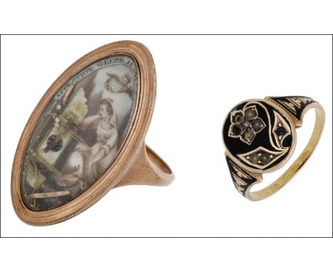 A late 18th century mourning ring and a mid 19th century mourning ring, the first depicting a grieving woman beside a tomb, m