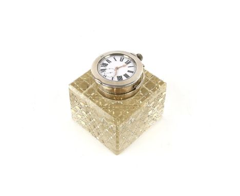 Silver mounted glass inkwell, the hinged lid fitted with an enamel dialled pocket watch, square with diaper pattern base, Bir