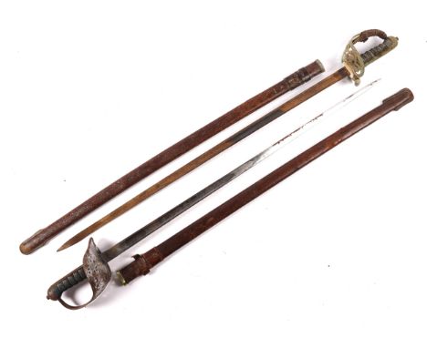 A Victorian 1854 pattern Grenadier Guards officer's sword, etched blade by Wilkinson, with battle honours, the back edge numb