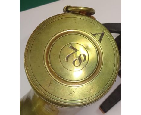An early 19th century horn powder flask for a Baker flintlock rifle, 9½", with brass top and fixed charger, slightly domed br