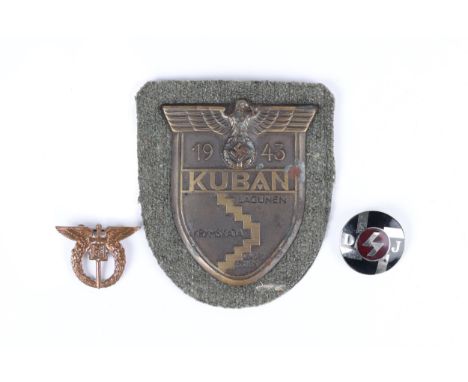 A Third Reich Kuban shield on field grey patch, A Deutsche Jungvolks enamelled badge and a miniature Czech pilot's pin back b
