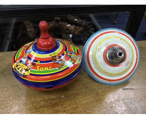 VINTAGE CHAD VALLEY HUMMING TOP TINPLATE TOY, 20cm diameter, along with another part tinplate spinning top (2)