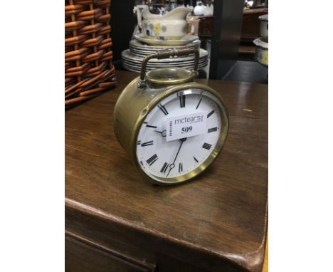 EARLY 20TH CENTURY BRASS ALARM CLOCK, 10cm high, along with a stainless steel model yacht (2)