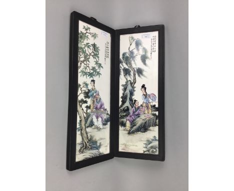 PAIR OF CHINESE CERAMIC TILES, depicting figures in a woodland setting, each framed, each 21cm x 54cm overall (2)
