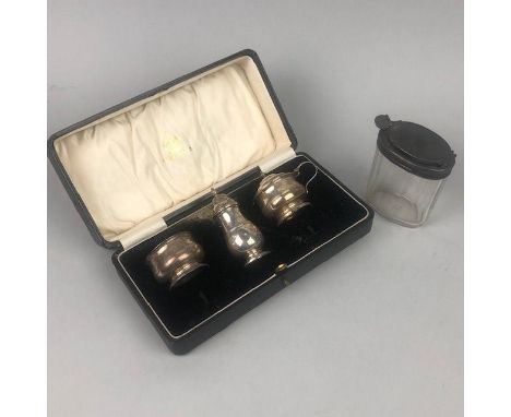 SILVER THREE PIECE CRUET SET, in case, along with a silver lidded jar (2)