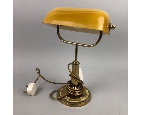 BRASS DESK LAMP, in a vintage style with amber glass shade and circular base, 36cm high