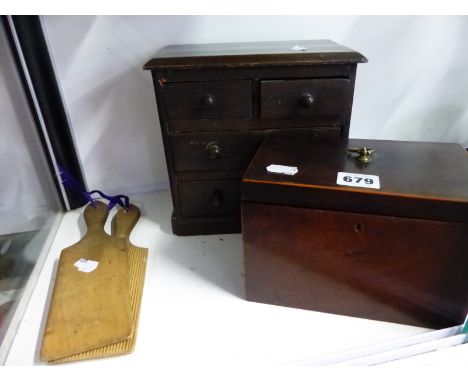 A MINIATURE CHEST OF THREE DRAWERS, A MAHOGANY TEA CADDY AND A PAIR OF BUTTER PATS