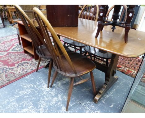 AN ERCOL DINING TABLE AND FOUR WINDSOR BACK STYLE CHAIRS W 152 X D 76 X H 72 CM