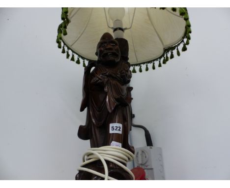 A CHINESE HARDWOOD DAOIST IMMORTAL TABLE LAMP