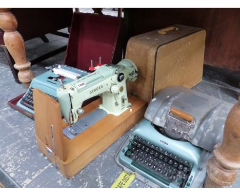 A RETRO MID CENTURY ALLOY CASED IMPERIAL TYPE WRITER, A LATER OLIVETTI STUDIO 44 TYPEWRITER AND A SINGER SEWING MACHINE MODEL