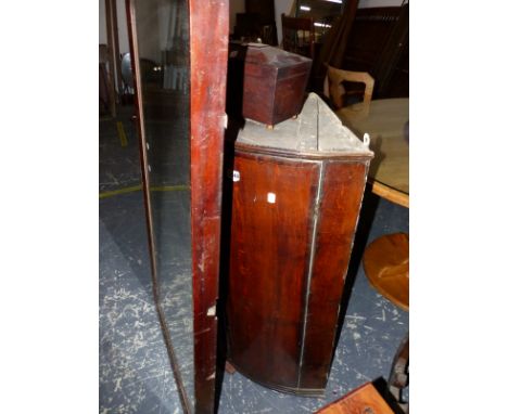 A GEORGE III OAK BOWFRONT CORNER CABINET, A MAHOGANY TEA CADDY AND A LARGE MIRROR (3)