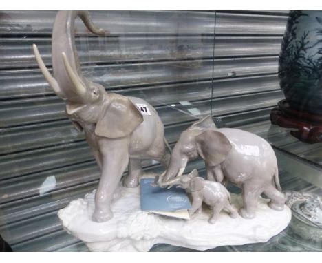 A LLADRO PORCELAIN FAMILY OF THREE ELEPHANTS