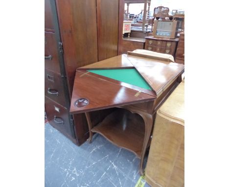 A EDWARDIAN MAHOGANY ENVELOPE CARD TABLE RETAILED BY T G WOOF LTD. W 60 X D 60 H 74 (CLOSED). 