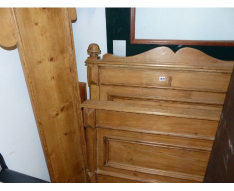 AN ANTIQUE PINE SINGLE SLEIGH BED WITH PANEL ENDS. 