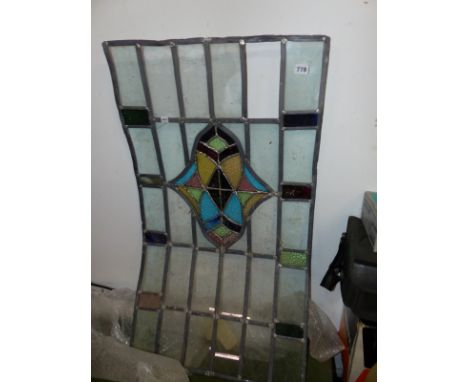 A LEADED GLASS PANEL. 