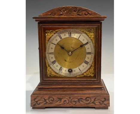 An oak cased mantel clock, Camerer Cuss and Co, London, Roman numerals on silvered chapter ring, 23.5cm high 