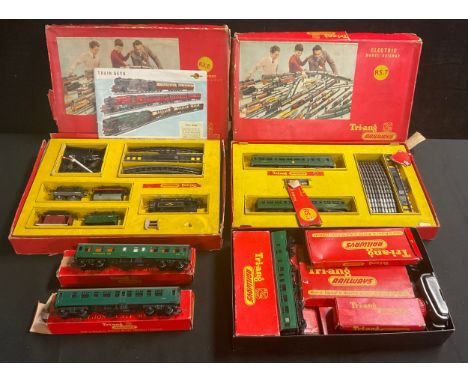 A Tri-ang model railway outfit, diesel electric, boxed RS.7; another, good outfit, R3.E, boxed; some other carriages, Princes