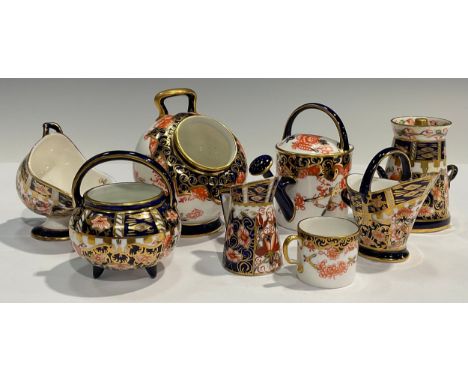 A Royal Crown Derby Imari 2649 pattern miniature watering can, 7.5cm, printed marks, year cypher for 1911; others, ovoid hair