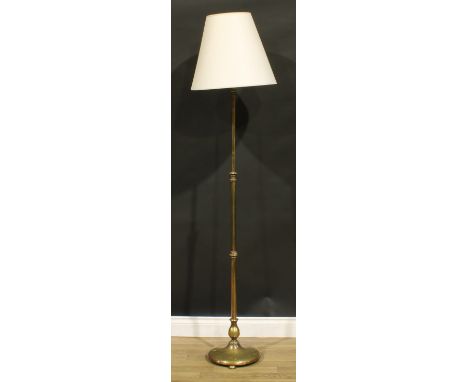 Interior Design - a brass telescopic floor lamp, raising to 151cm high under fitting 