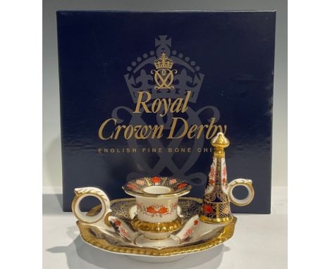 A Royal Crown Derby Imari 1128 pattern chamber stick and candle snuffer, 15cm wide, first quality, boxed 