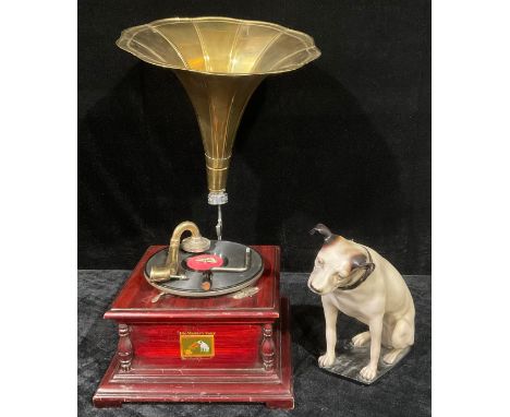 A reproduction HMV table top wind up gramophone, with brass trumpet, winder; a resin model of Nipper, 35cm (2) 