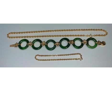 A 9ct gold fancy link necklace; a conforming 9ct gold fancy link bracelet; a jade and gold coloured metal hoop link bracelet 