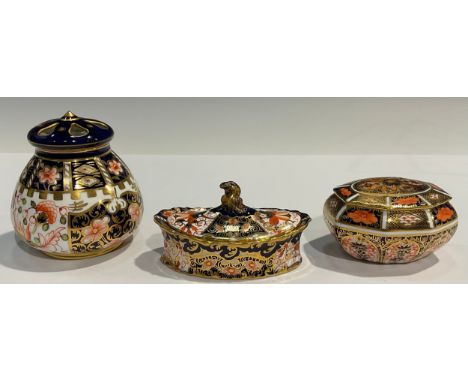 A Royal Crown Derby Imari 6299 pattern compressed ovoid pot-pourri vase and cover, 9cm, year cypher for 1917, printed marks; 