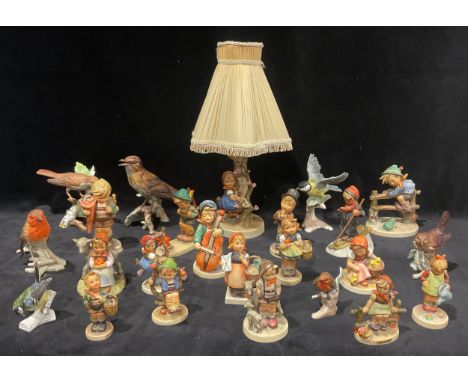A Goebel Hummel table lamp, Apple Tree Girl; Goebel Hummel figures including Little Scholar, Retreat to Safety, Sweet Music, 