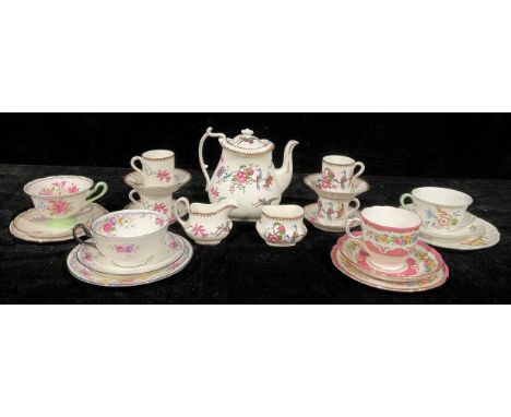 A Paragon coffee service for four, decorated with fanciful birds amongst blossoming leafy stems, comprising coffee pot, cream