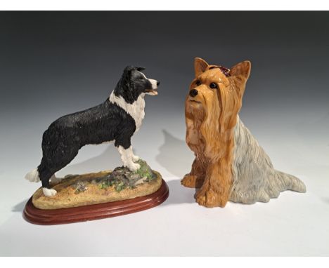 A Beswick fireside model, of a Yorkshire Terrier, seated with ribbon, 26cm high, impressed mark, model no.2377; a Border Fine