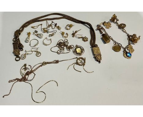 A 9ct gold charm bracelet, 15g; 9ct gold necklace chains, some broken, 7g; a rose gold and citrine pendant, 1.8g; assorted go