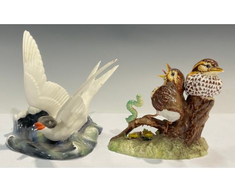 A Royal Crown Derby model, Thrush Chicks, 13cm, printed marks; another, Seagull, 16cm, printed marks (2) 