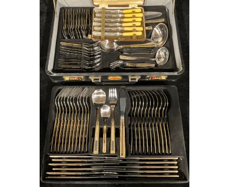 A set of Prima stainless steel flatware for twelve, including soup ladle, cake slicer, salad servers, sauce ladle, pastry for