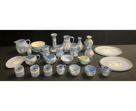 A quantity of Wedgwood blue jasperware including candlestick, jugs, vases, oval dishes, etc, qty 