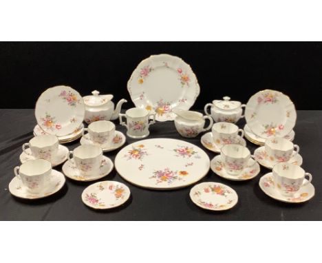 A Royal Crown Derby Posies pattern tea service for eight, comprising cake plate, bachelor teapot, sucrier and cover, cream ju