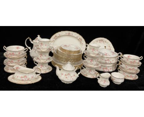 A Paragon Victoria Rose pattern dinner and tea service for six, comprising vegetable dishes, sauce boat and stand, dinner pla