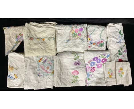Textiles - hand embroidered linen tablecloths including English country flowers, crinoline lady, etc 