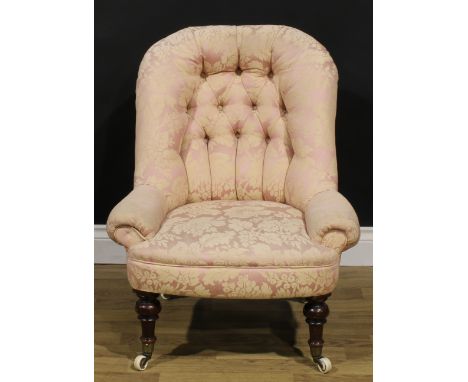 A Victorian low drawing room chair, of small proportions, turned forelegs, ceramic casters, 77cm high, 63.5cm wide, the seat 