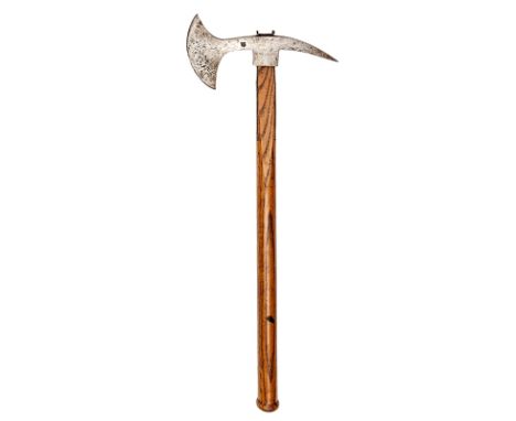 A late 18th century axe,  blade 5½”, curved square section spike, deeply struck armourer’s mark, with tangs secured to shaped