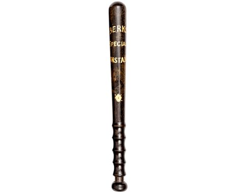 A “Berks Special Constable” polished darkwood truncheon, the tile painted in gilt capitals with small rose below, shaped grip