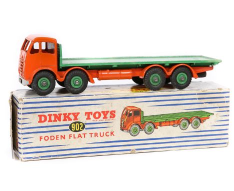 Dinky Supertoys Foden Flat Truck (902). An example in orange with mid green load platform and lighter green wheels. Boxed, so