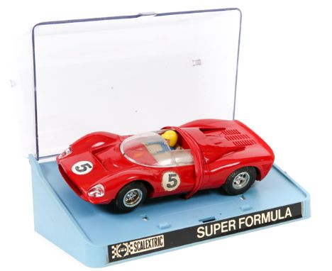 A 1970’s Scalextric ‘Super Formula’ series Ferrari 330 P4S (101274). In Italian racing red, RN5, driver with yellow helmet. I