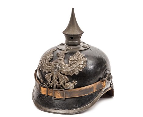 A Prussian enlisted man’s pickelhaube, with leather skull, grey steel badge and fittings, and original leather lining and chi