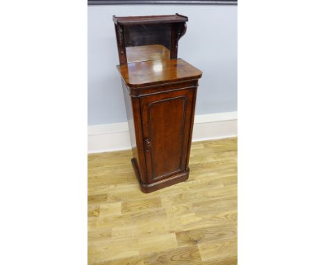 A 19th Century mirror backed bed side cabinet, having a moulded shelf above mirrored back & panel door, enclosing a shelved i