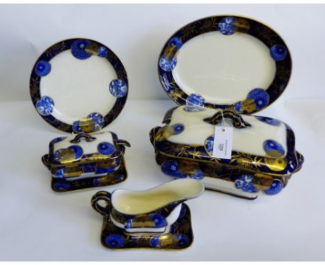 19th century Doulton, Burslem, flow blue, Japonism blue and white dinner service comprising twelve dinner plates, twelve medi